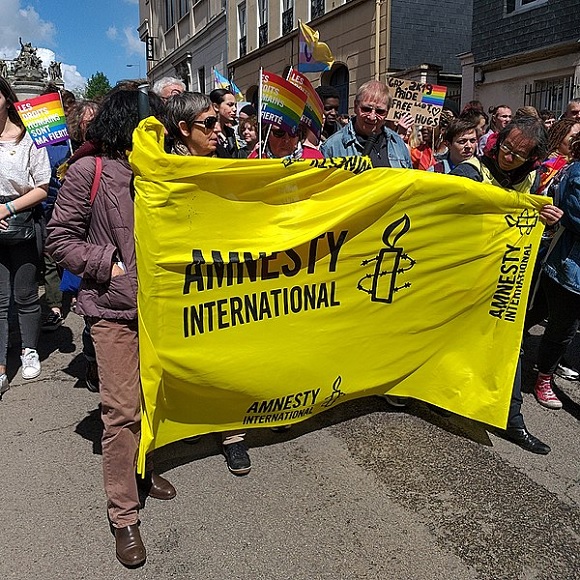 Amnesty International protests in headline news & bulletin news