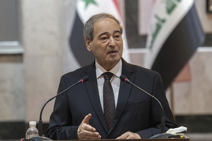 Syria's foreign minister in online news & world news