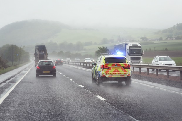 Police on a motorway in the UK in world news & online news